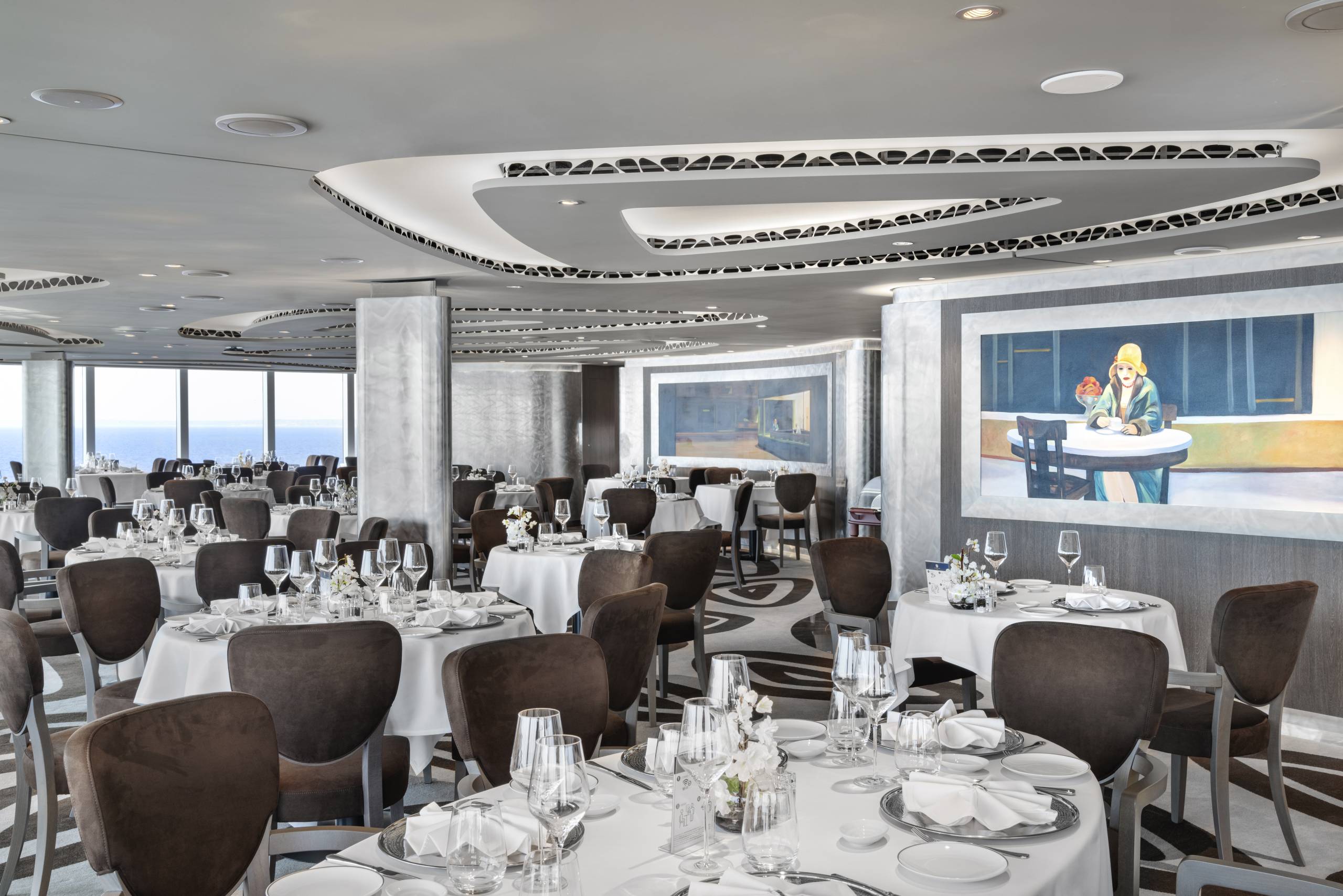 Dining room with the Yacht Club upgrade on the MSC Seashore.