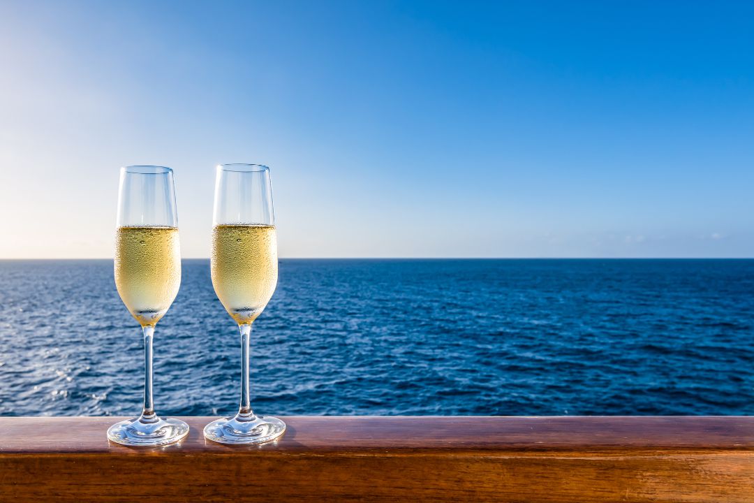 Two glasses of champagne on board a cruise ship.