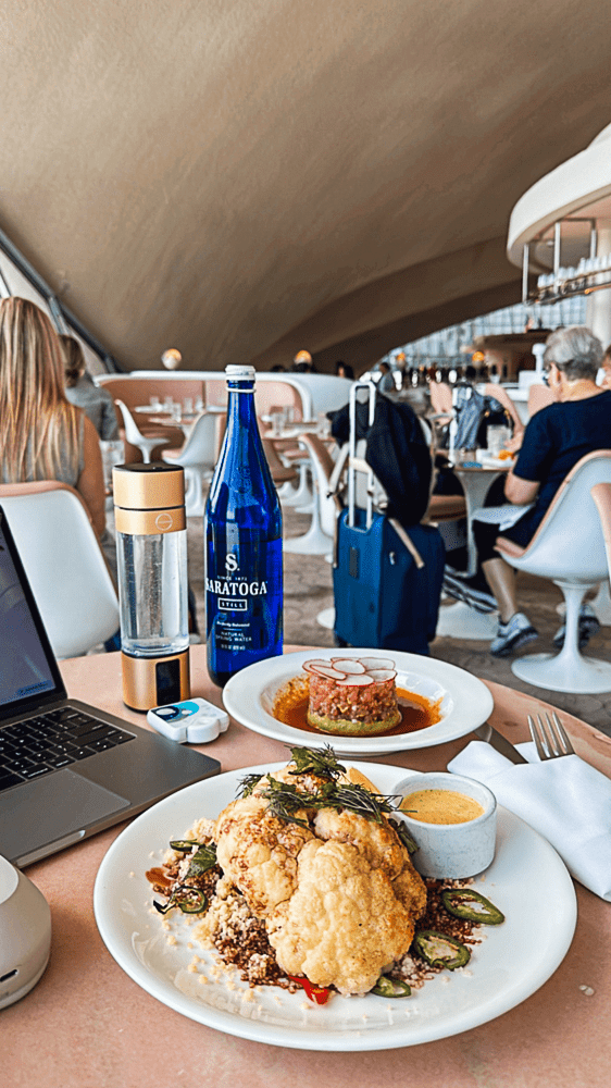 A plate with food at the Paris Cafe at TWA Hotel inside JFK Airport.