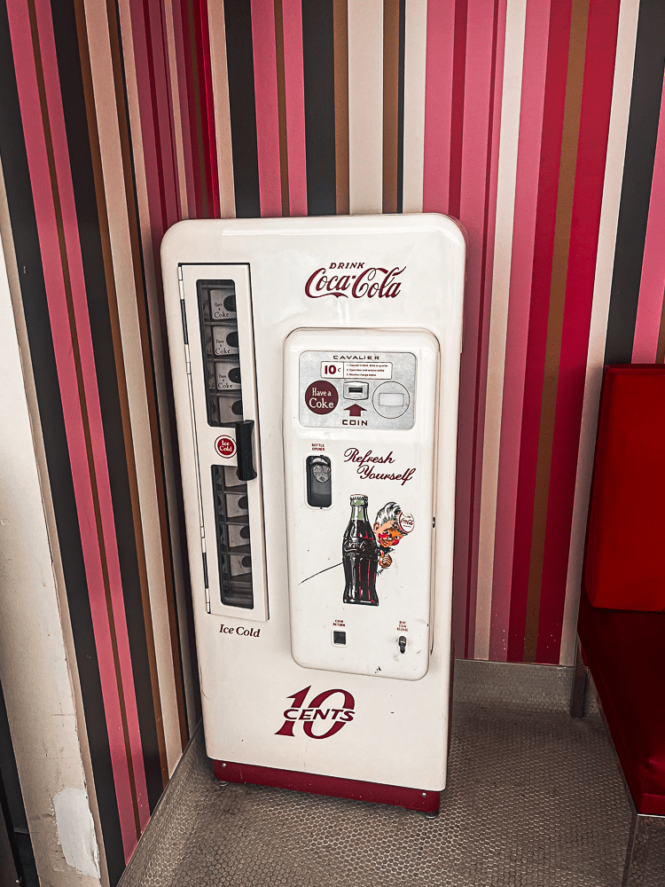 A retro Coca Cola dispenser at TWA Hotel.