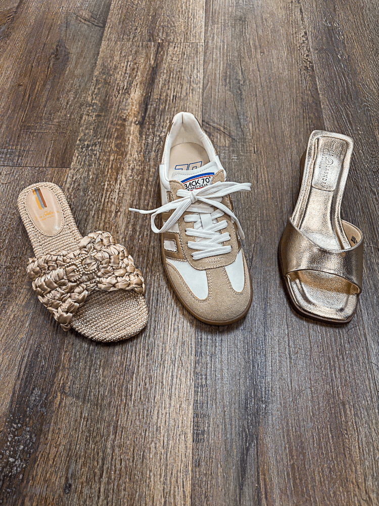 Three pairs of shoes, sandals, sneakers and evening shoes.