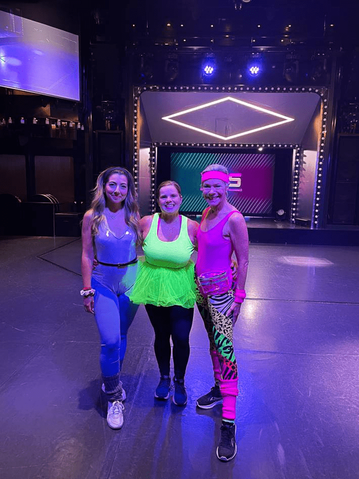 Three women during a special event on a cruise.