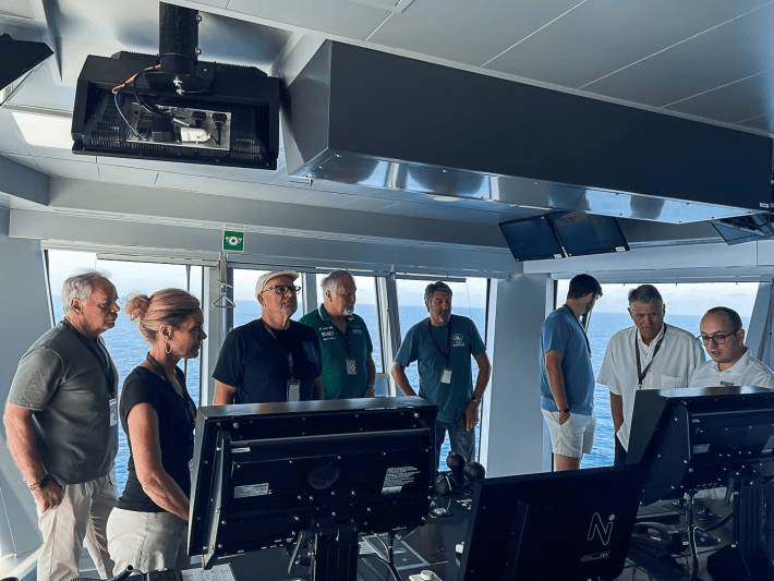 Jenny Lynn and a group of other people on a cruise.