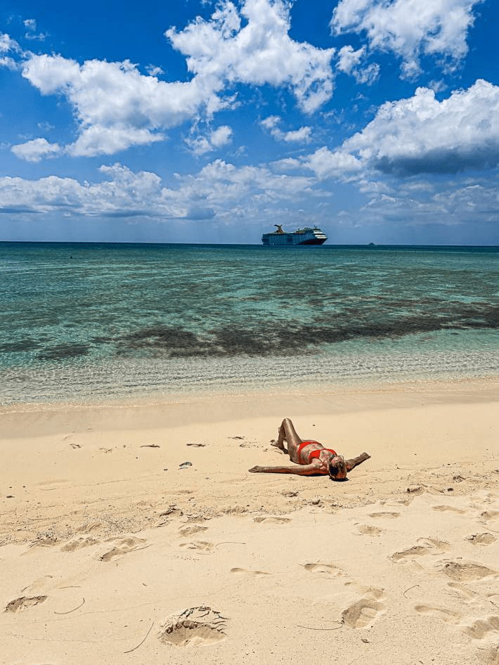 Jenny Lynn Anderson laying on the beach.