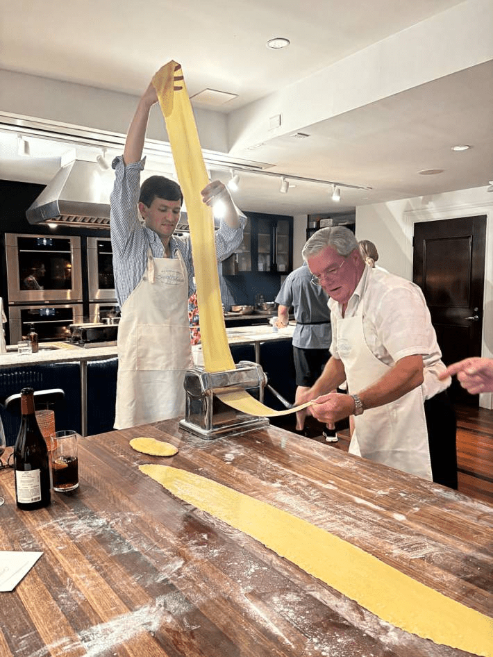 Men preparing dough at the Saint Bibiana Cooking School at Hotel Bardo in Savannah, Georgia.