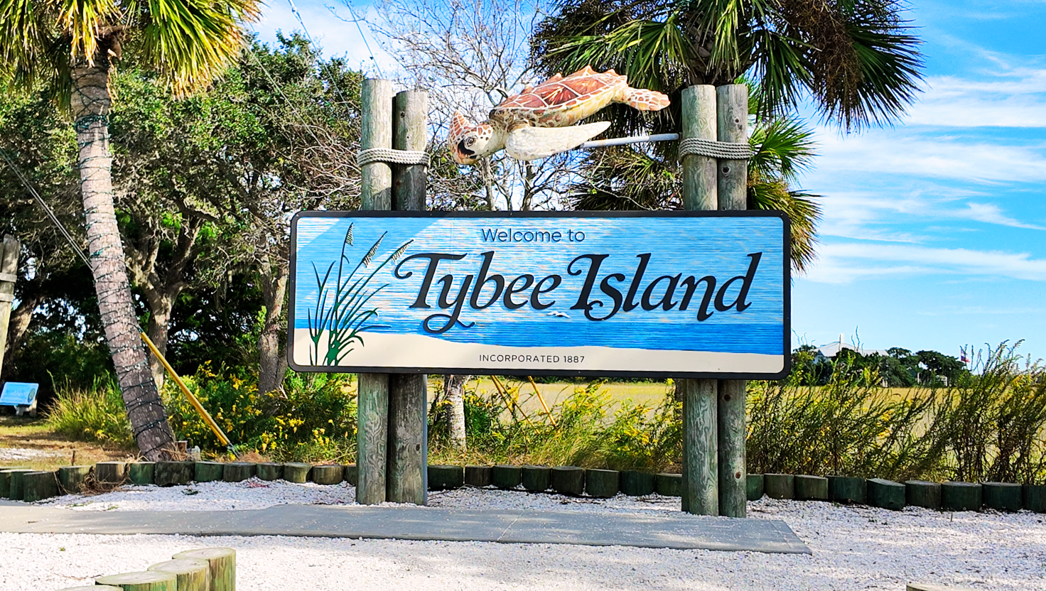 Welcome to Tybee Island Georgia sign featuring sea turtle symbol at island entrance