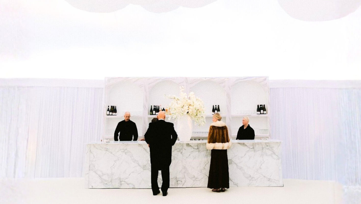 Telfair Gala attendees dressed in formal evening attire at a Savannah gala event