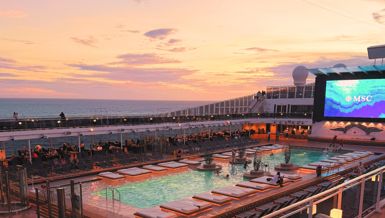MSC all-inclusive drink package with cocktails on deck at sunset