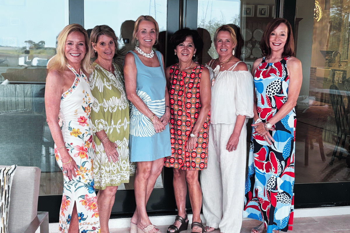 6 women dressed up during a girls trip in Savannah.