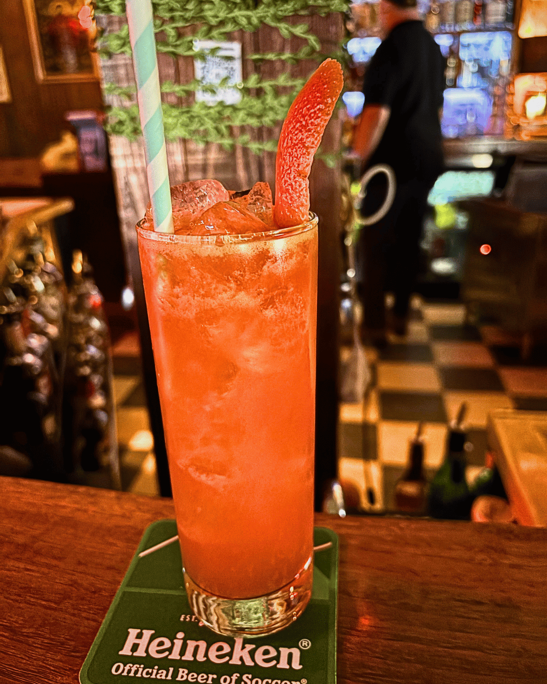 Treating objects like women drink at lone wolf dive bar. 